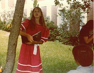 signing a yearbook in a new dress