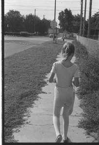 balletgirl walking to ballet class from mom's apartment