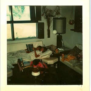 my dad made the sofas, the footstool, the table, the lamp, the plant holder.  I'm reading a story to a neighbor girl.