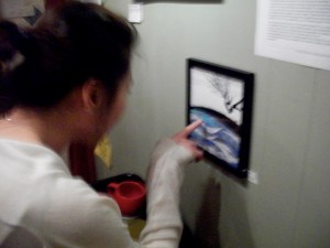 a student looks at my art