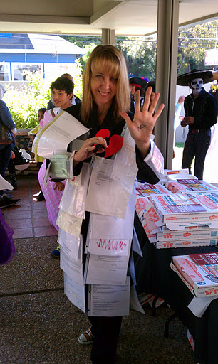 My Halloween costume from 2011. I went as Rejection. I wore all my rejection letters, and I pinned a broken heart to my chest. 